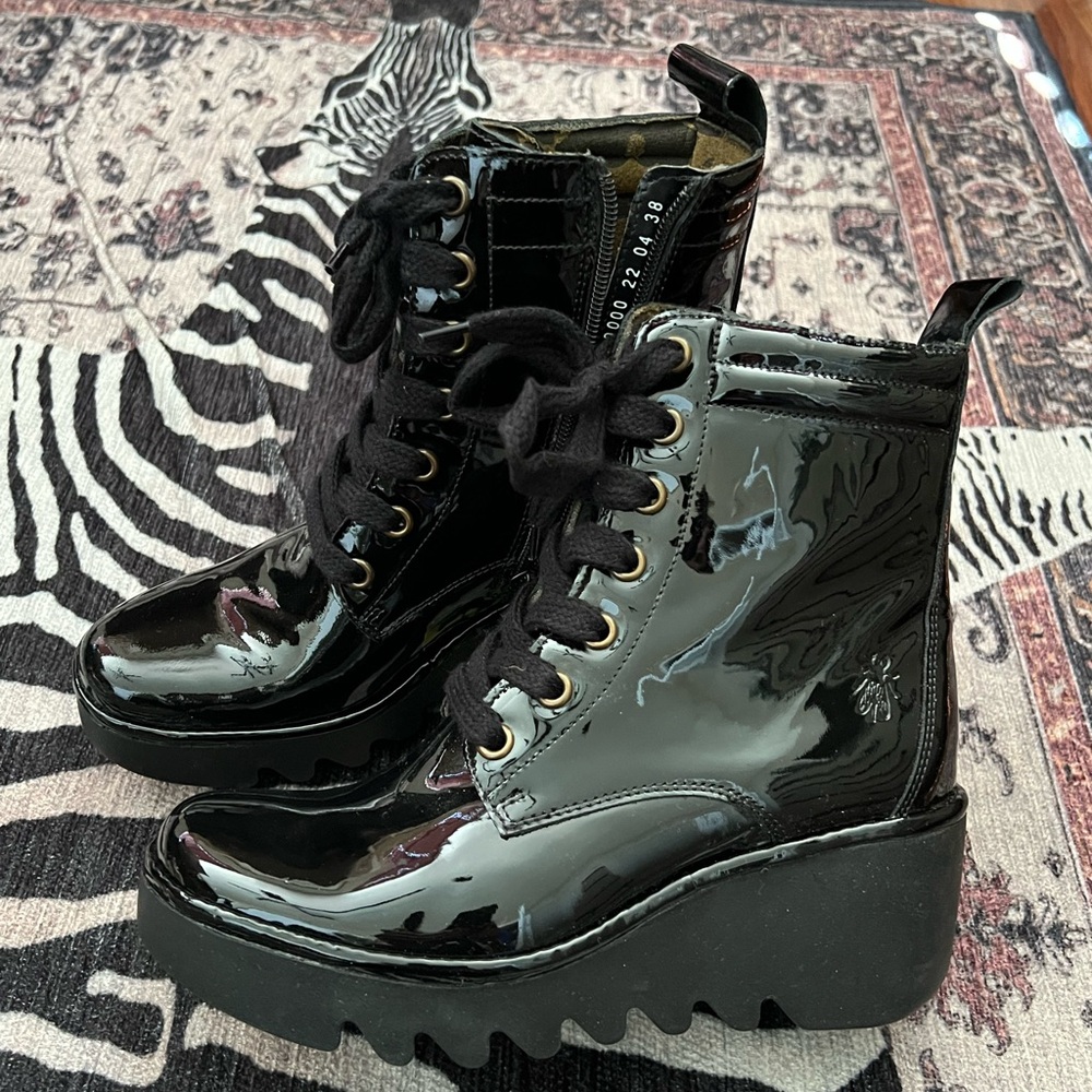 Gorgeous black patent leather lace up boots